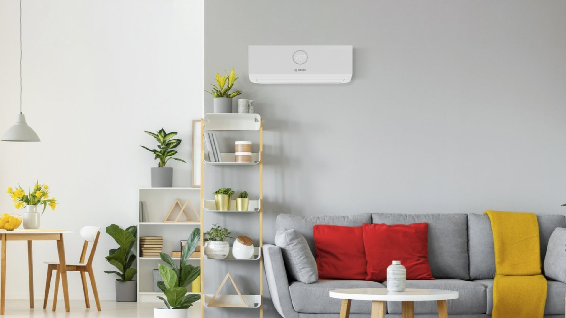 Air conditioning installation on grey wall